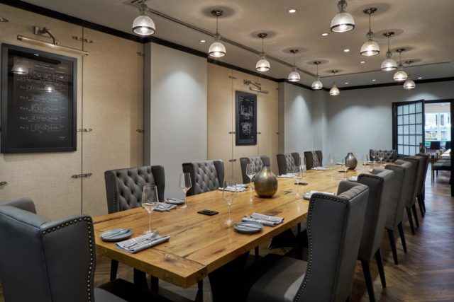 brown wooden table with chairs